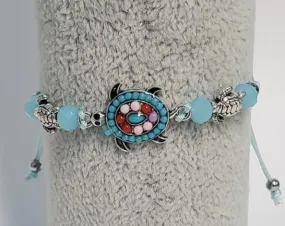 B162 Light Blue Bead Turtle Cord Bracelet